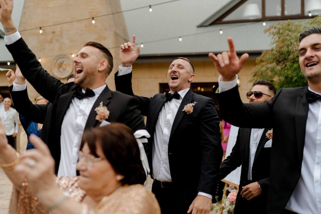 Groomsman singing