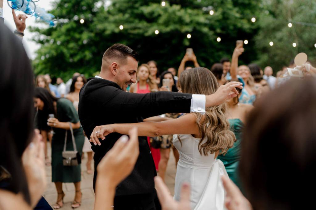Bride and groom dancing on dancefloor