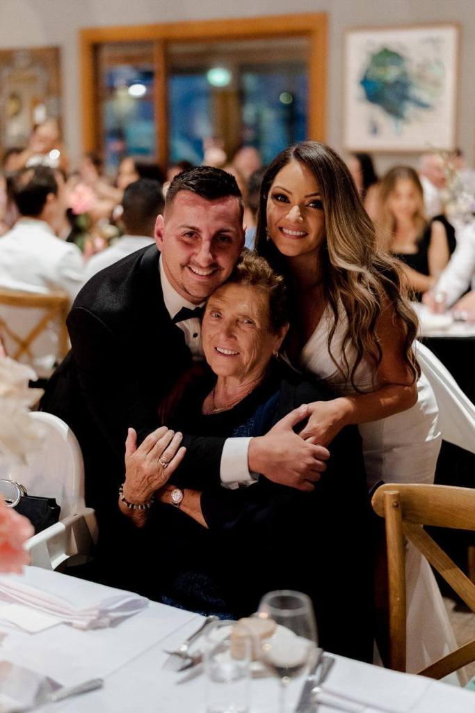 Smiling photo with grandparents