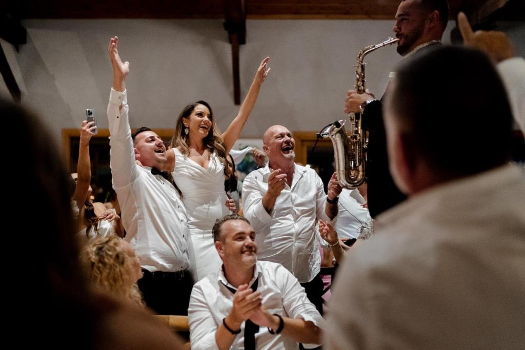 Guests dancing to saxophone