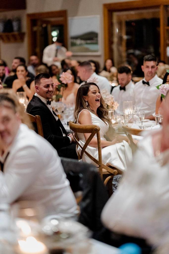 Bride and groom laughing
