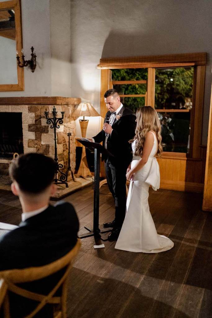 Bride and groom giving speech