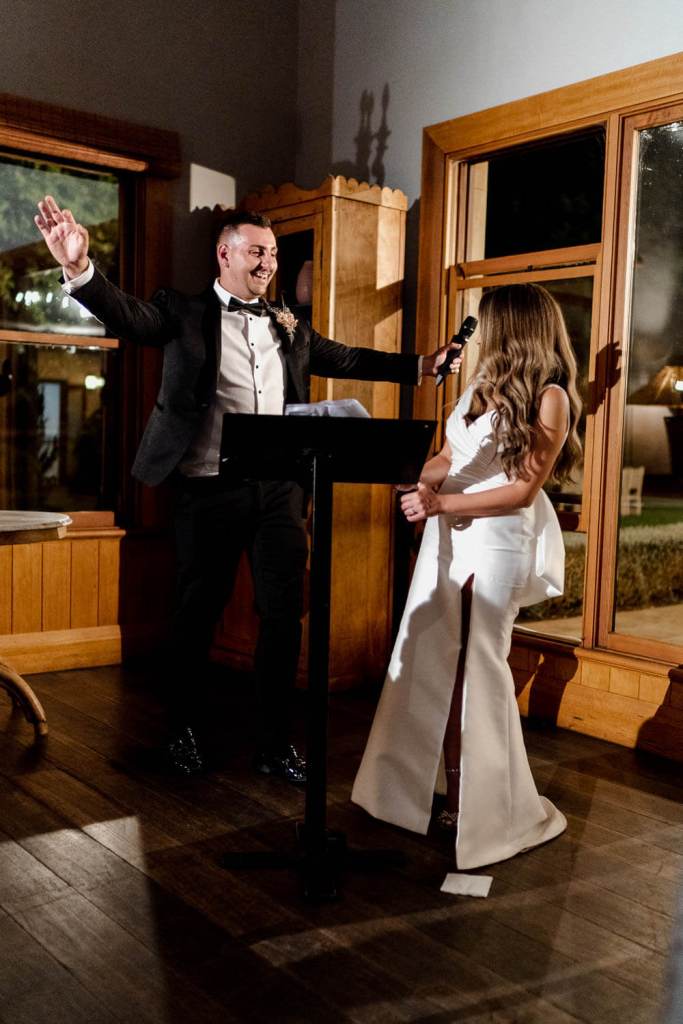 Bride and groom laughing candidly