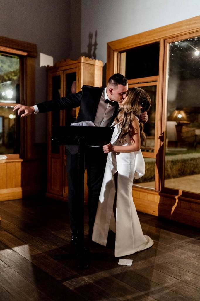 Bride and groom kissing