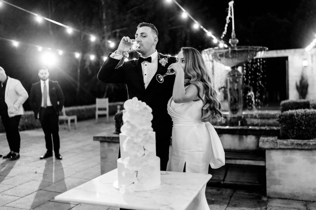 bride and groom drinking