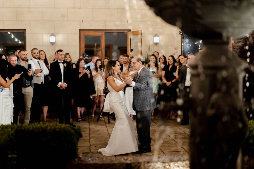 father daughter dance with fountain