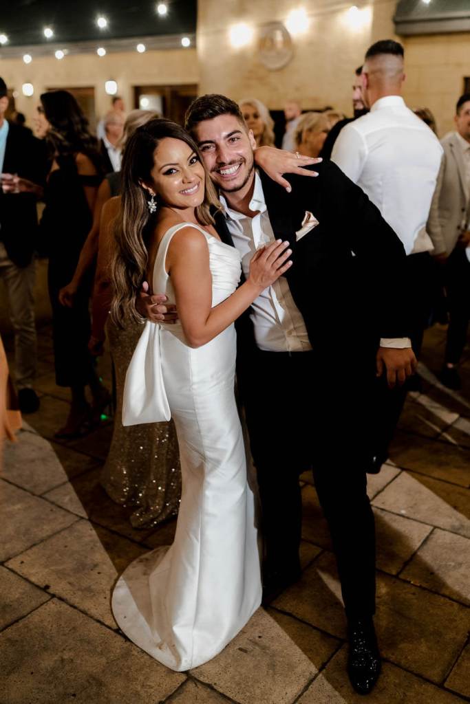bride smiling with brother