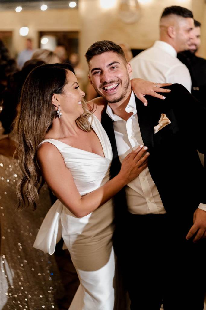 bride smiling with brother