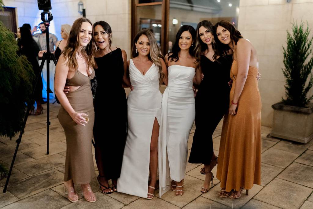Bride smiling with guests
