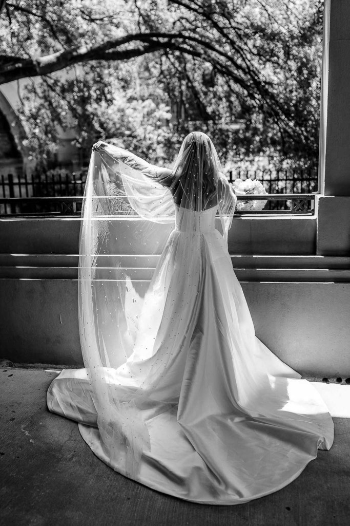 bride resting with flowers black and white