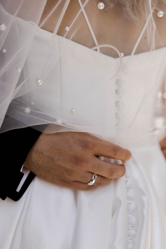 grooms ring on dress