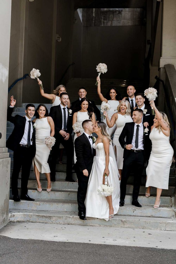 bridal party on stairs