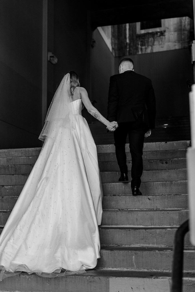 couple walking up stairs