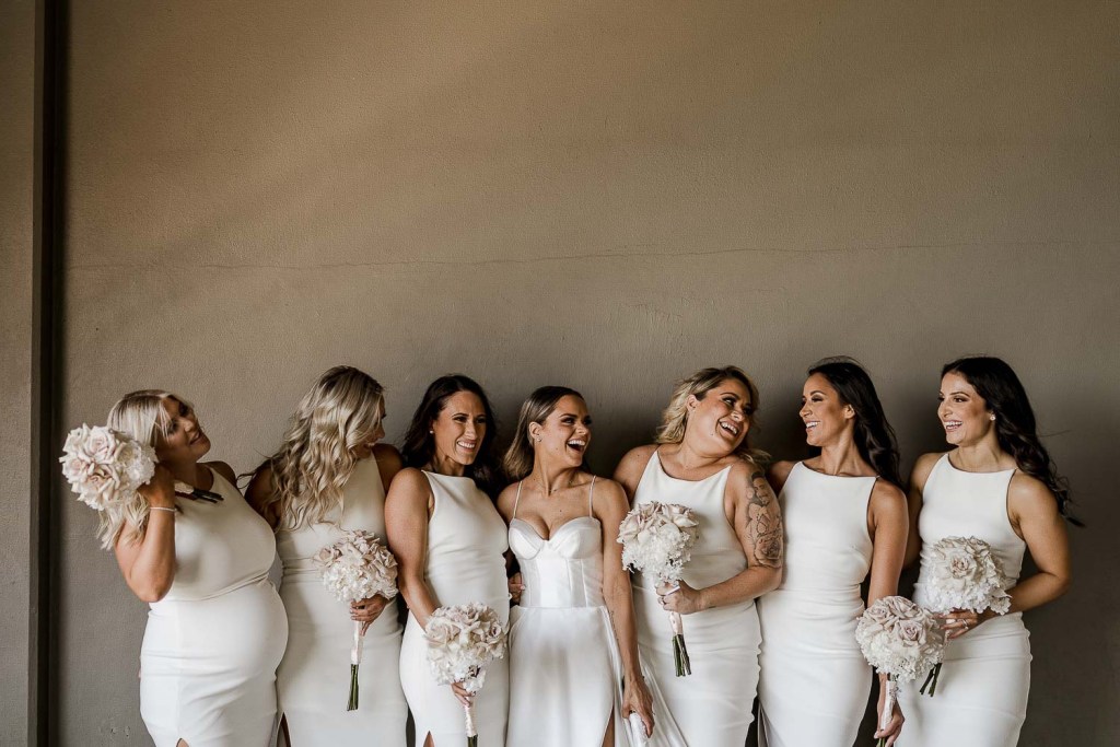 bridesmaids laughing together