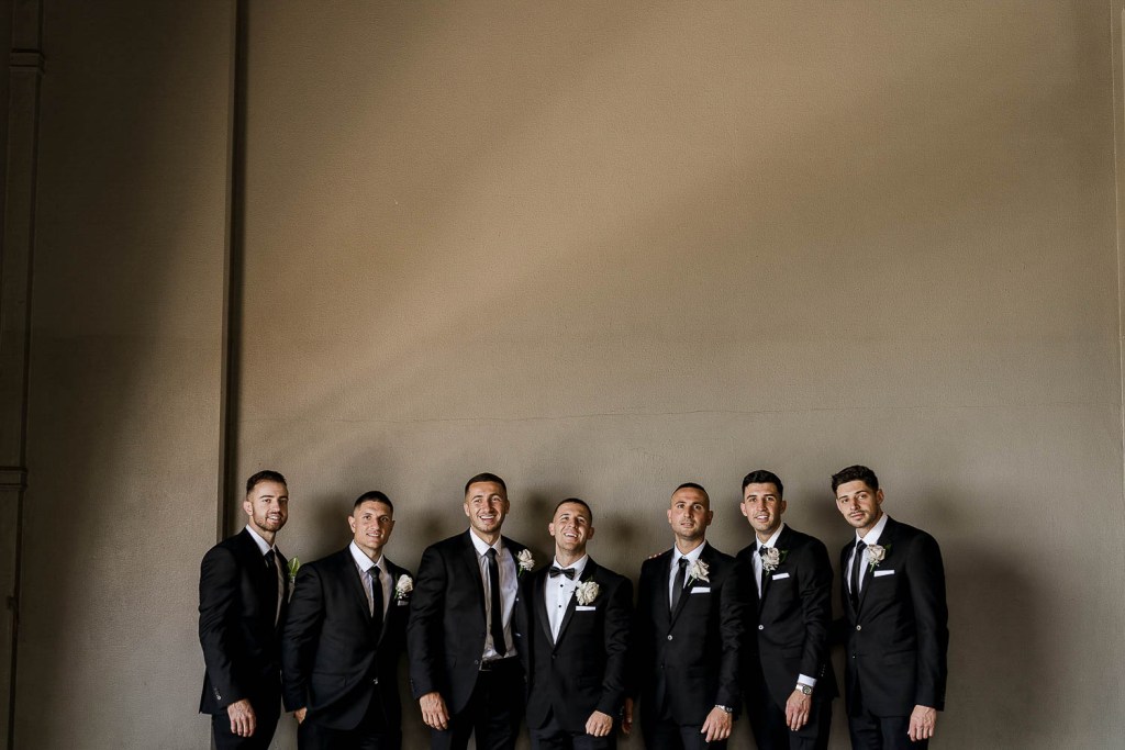 groomsman laughing together