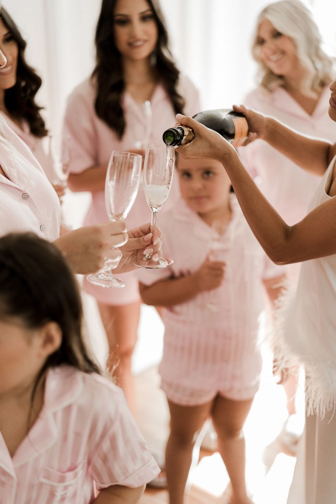pouring a drink of champagne