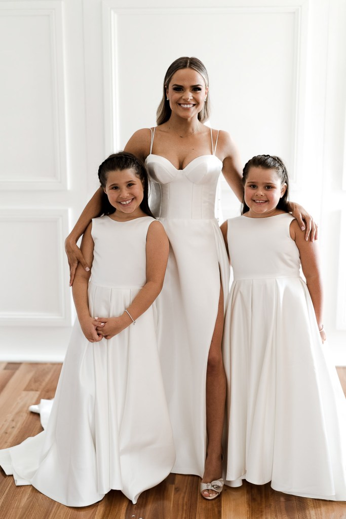 3 girls smiling at camera