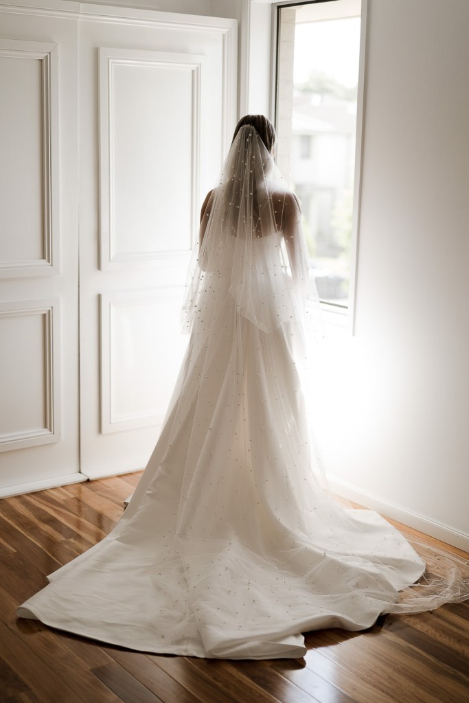 bride looking outside window