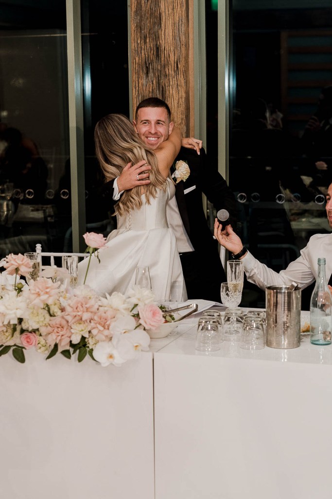 couple hugging on speech