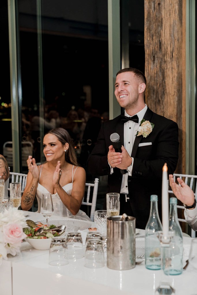 man and women smiling in distance