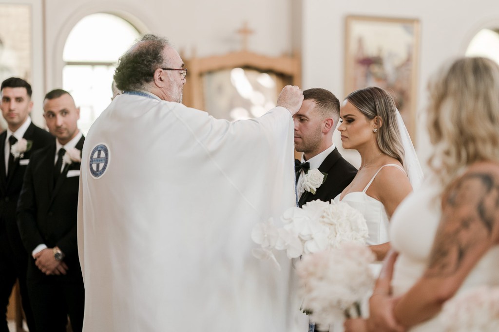 priest giving preyer