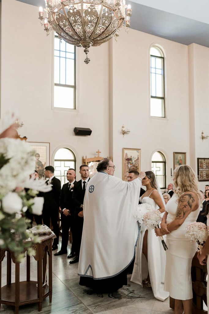 priest giving preyer
